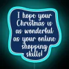 Neon sign with colorful, cursive Christmas phrases in bold, rainbow hues.