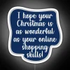 Neon Christmas sign with witty holiday statements in bold white letters on a colorful background.