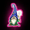 Neon sign featuring a wizard and gnome in pastel pink colors.