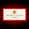 Vibrant neon wine label with wizard of wines logo in bold, red letters.