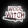 Neon sign featuring intricate, glowing wool knots in a mystical arrangement on a white background.