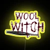 Witch's woolly yarn with neon-colored knots on a yellow background