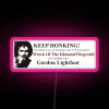 Wreck of the Edmund Fitzgerald tribute to Gordon Lightfoot's song with an RGB neon sign in pink color, inspired by a marit...