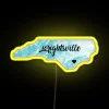 Wrightsville Beach, NC neon sign at night with a yellow glow