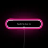 Neon pink sign with bold, playful letters spelling out 'You Found Me'