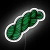 Fern green yarn skein with neon sign texture