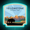 Yellowstone National Park explorer neon sign at dusk.