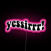 Neon pink sign with bold, cursive letters reading 'Yes Sir'