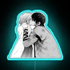 Two anime characters, Yona and Hak, illuminated in neon blue hues on a futuristic city sign.
