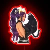 Yoruichi Shihoin from Bleach standing next to her iconic black cat in a vibrant, neon-lit cityscape.