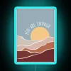 Neon sign reading 'You are enough' in blue, pink, and green colors.