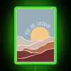 You are enough" neon sign with green letters, promoting self-confidence and positivity.