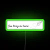 Neon sign with RGB lighting displaying a phrase about being brought home.