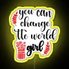 Empowering young girl holding up a vibrant neon sign with inspiring words, promoting positivity and global change.