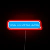 Psychoanalysis-inspired neon sign with bold, colorful lettering.