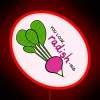 Neon sign with a colorful radish design, emitting a vibrant red glow.