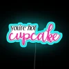 Neon sign with bold, colorful letters saying 'You're hot'