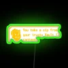 Neon sign with orange, green, and RGB colors reading 'You take a sip from your trusty Vault 13 canteen'