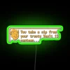 A futuristic, neon-lit canteen sign from the Fallout series Vault 13