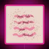 Neon sign with colorful, glowing letters reading 'Your life is as good as your mindset'