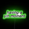Neon sign with a person's name in bold, colorful letters