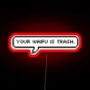 Neon sign with colorful letters spelling out a humorous insult about a romantic partner.