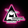 Neon sign reading 'Yoyodyne Propulsion Systems Team Banzai Black RGB' with pink accents.