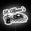 Colorful neon sign reading 'Zappa's St. Alfonzo's Pancake Breakfast'