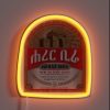 Vibrant Ethiopian beer branding in bright neon RGB colors