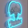 Colorful neon sign celebrating happiness with beer-themed whimsy vibe